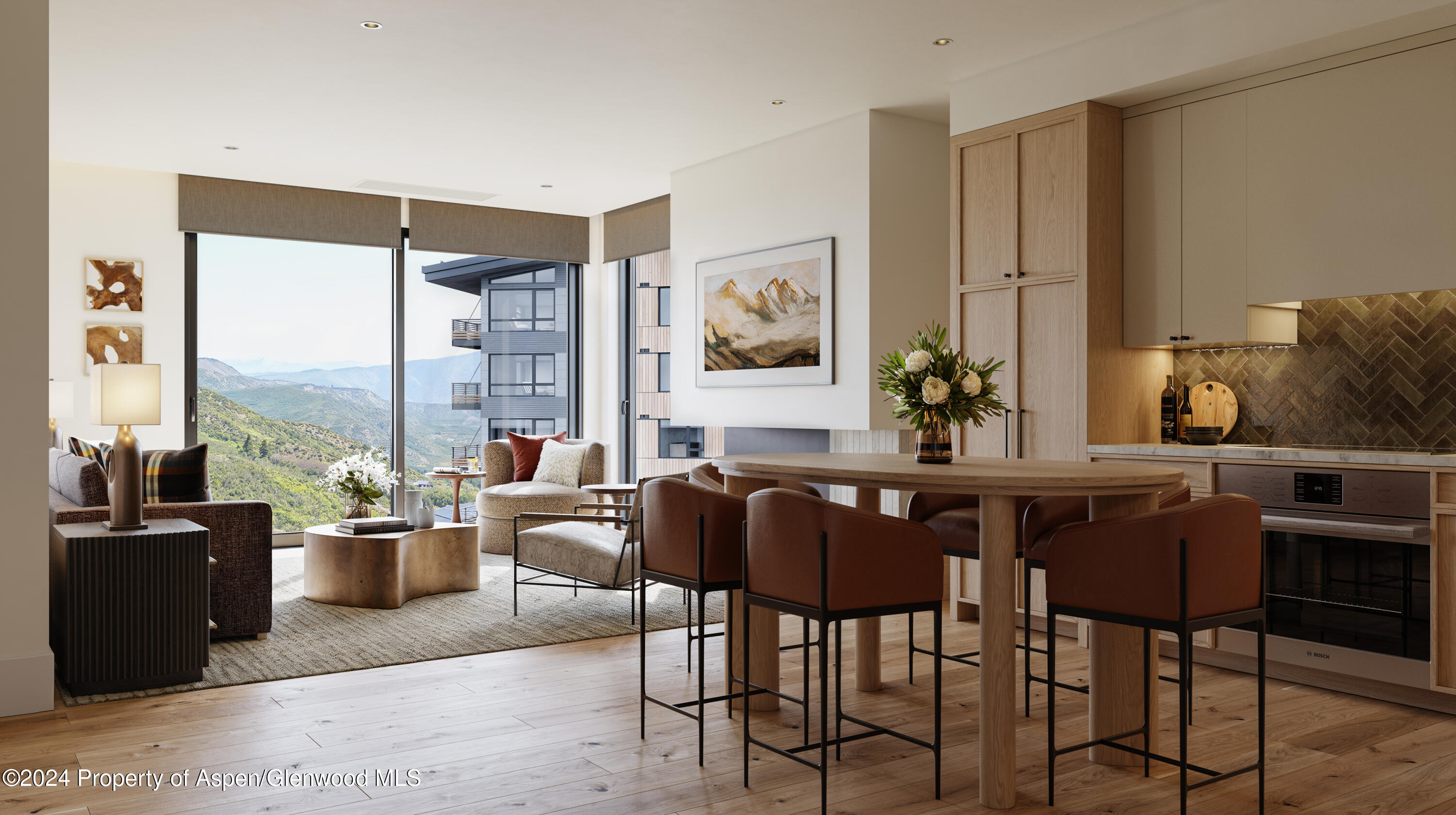 a dining room with furniture and large windows