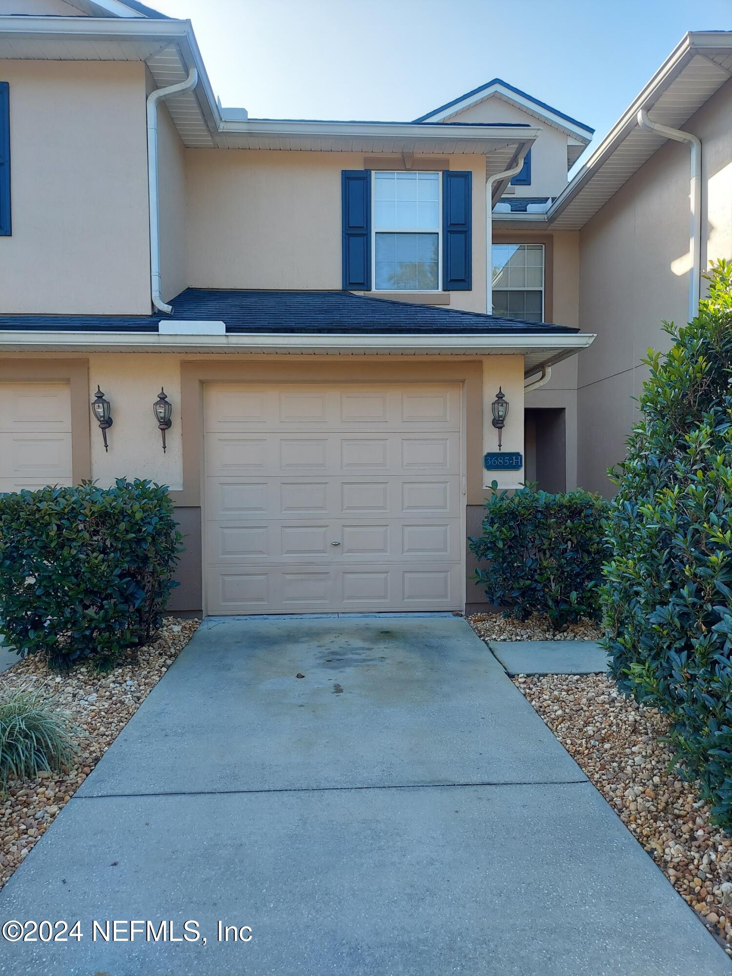 a front view of house with yard