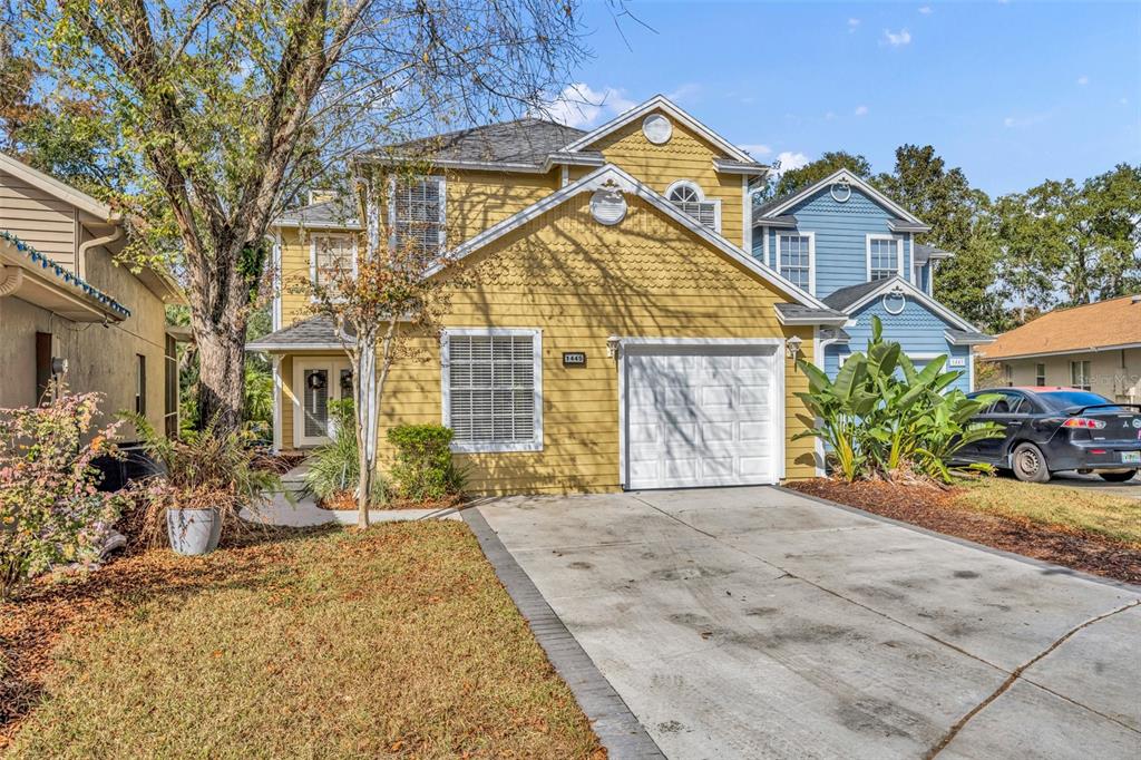 front view of a house with a yard