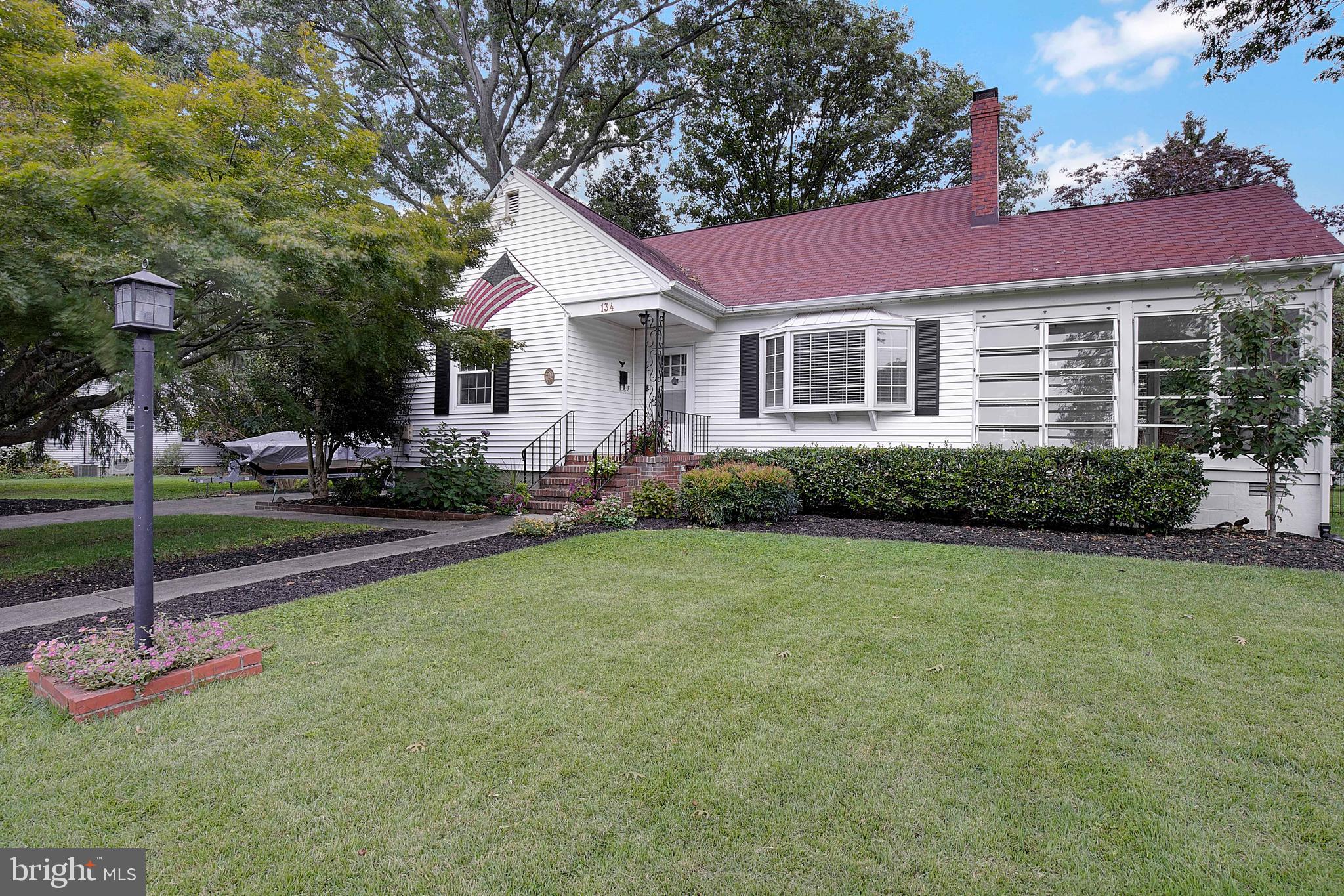 a front view of a house with entertaining space