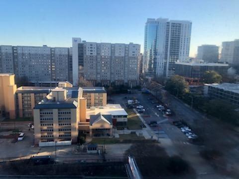 a view of a city with tall buildings