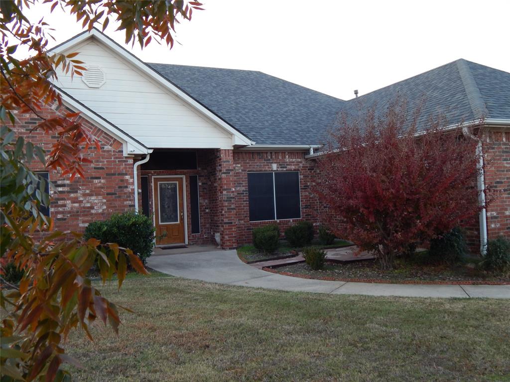 COVER PORCH AT ENTRY WITH OPEN PATIO