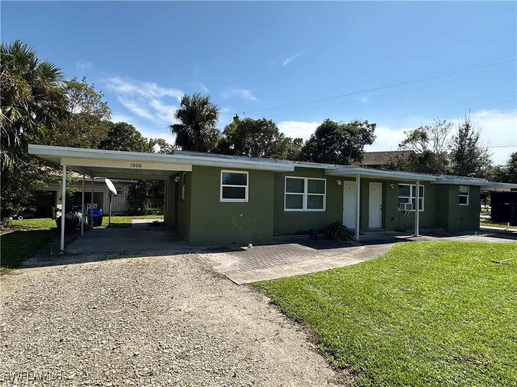 front view of a house with a yard