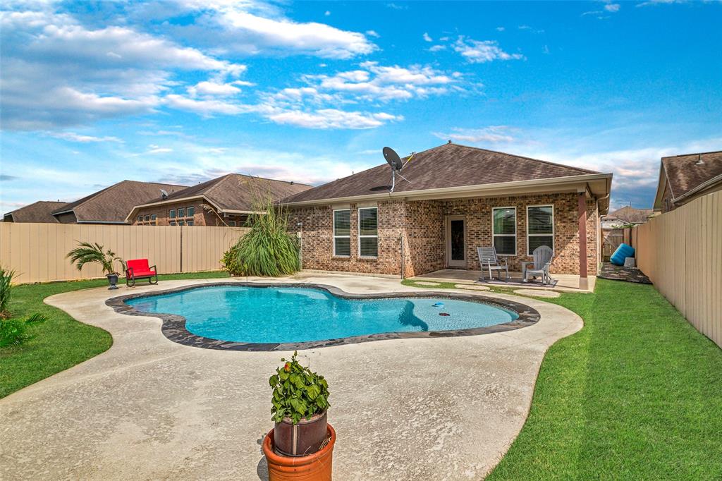 a view of outdoor space yard and swimming pool