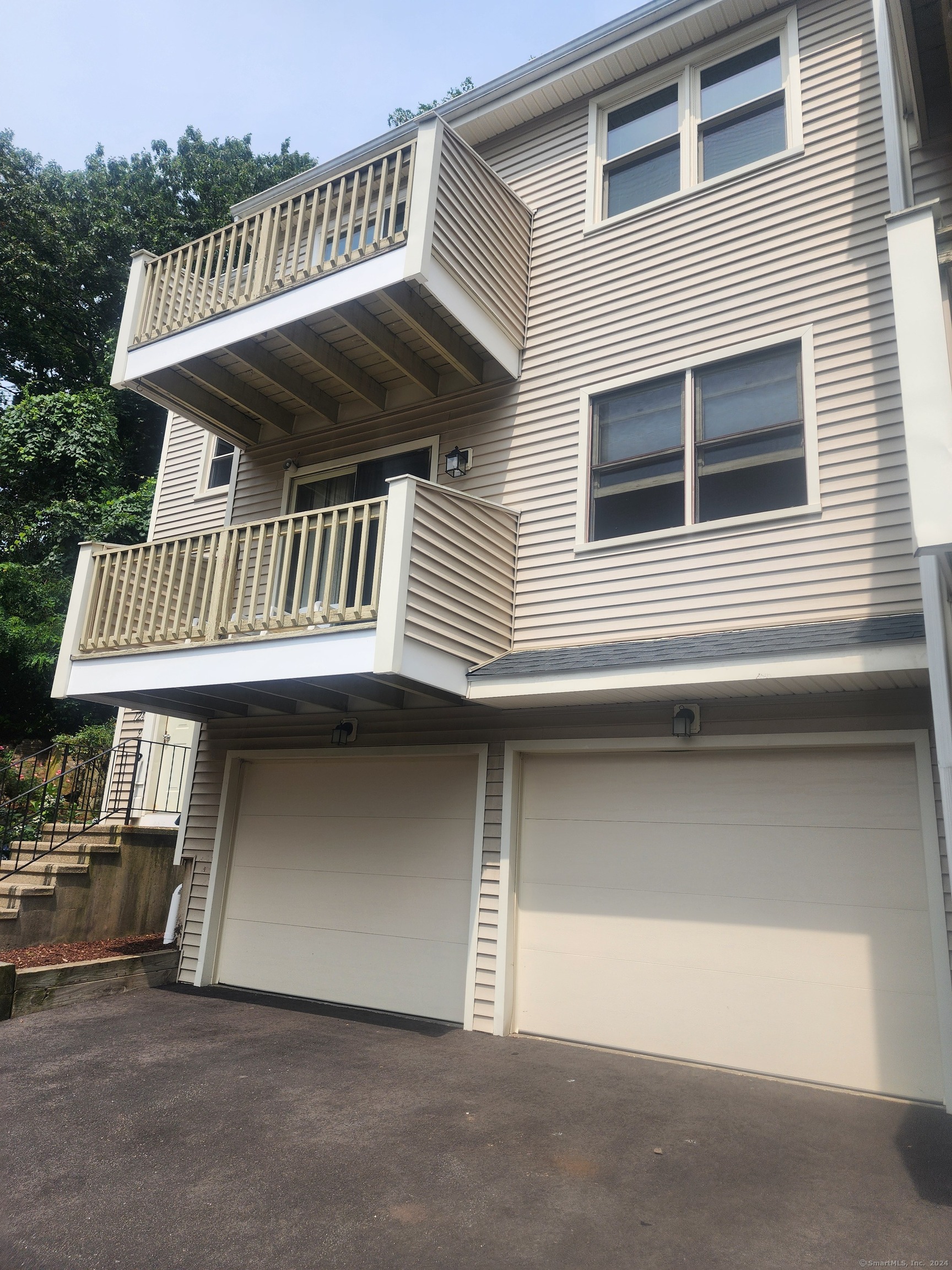 a view of house with roof deck