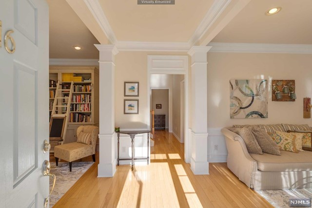 a bedroom with furniture and a rug