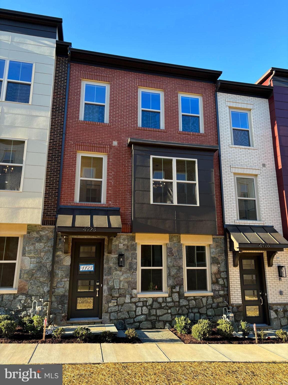 a front view of a multi story residential apartment building