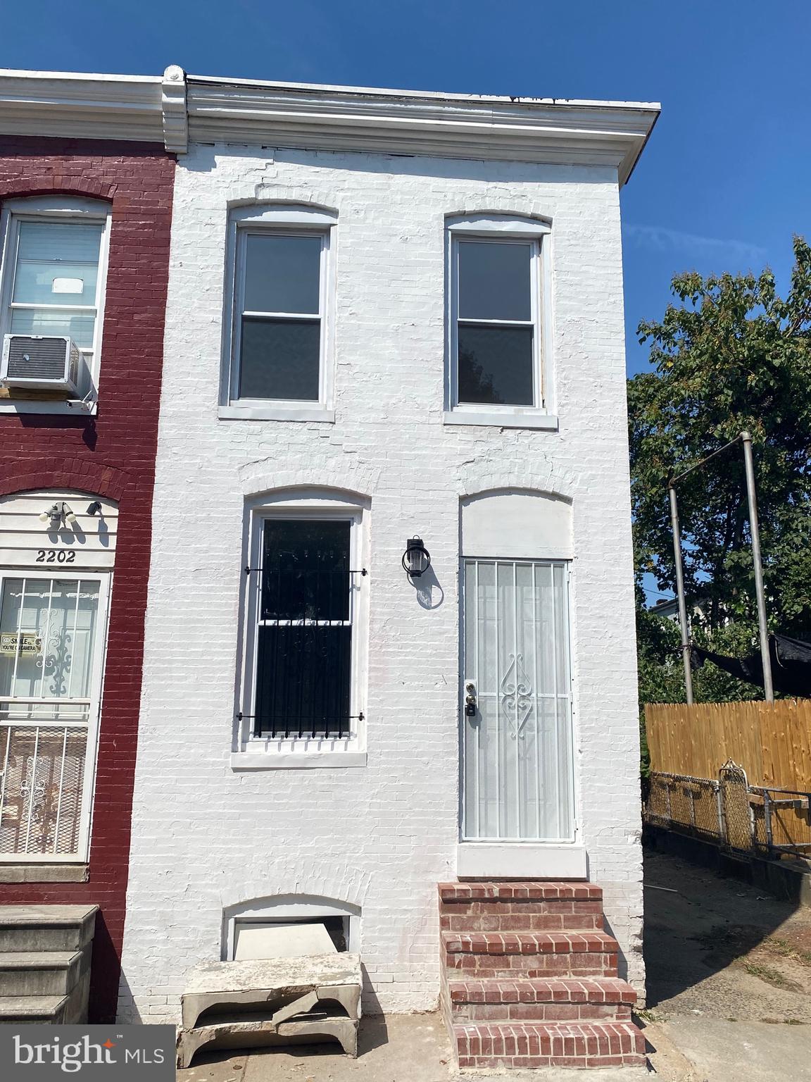 a front view of a house with a door