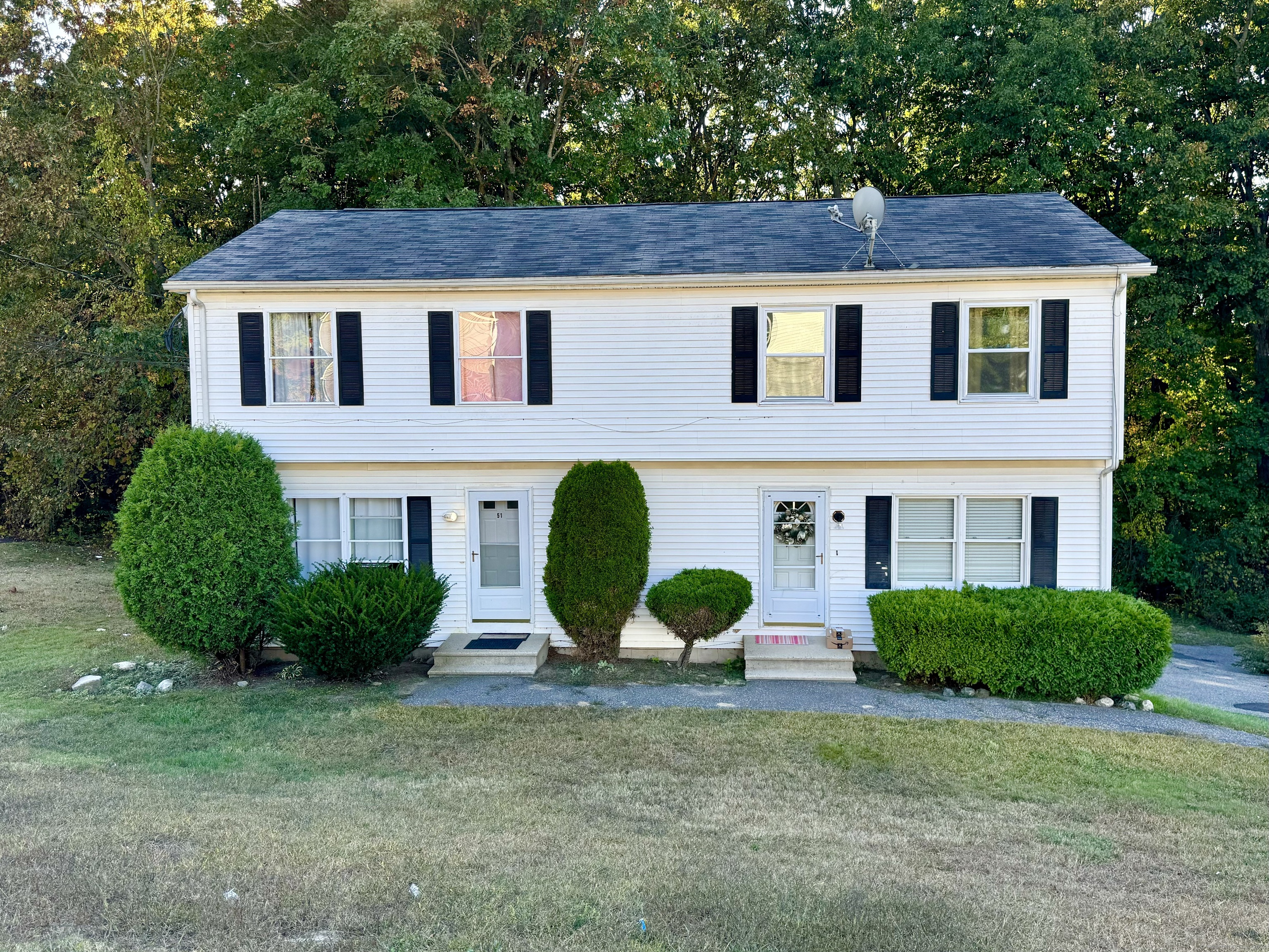 a house view with a garden space