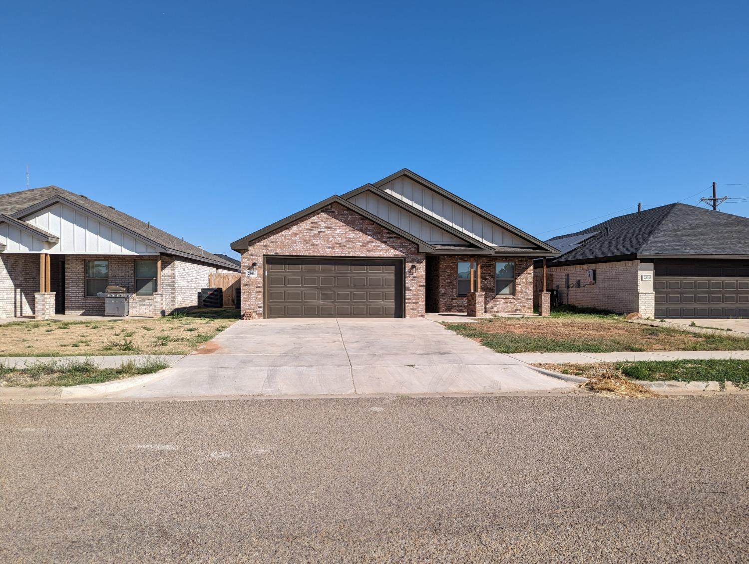 a front view of a house with a outdoor space