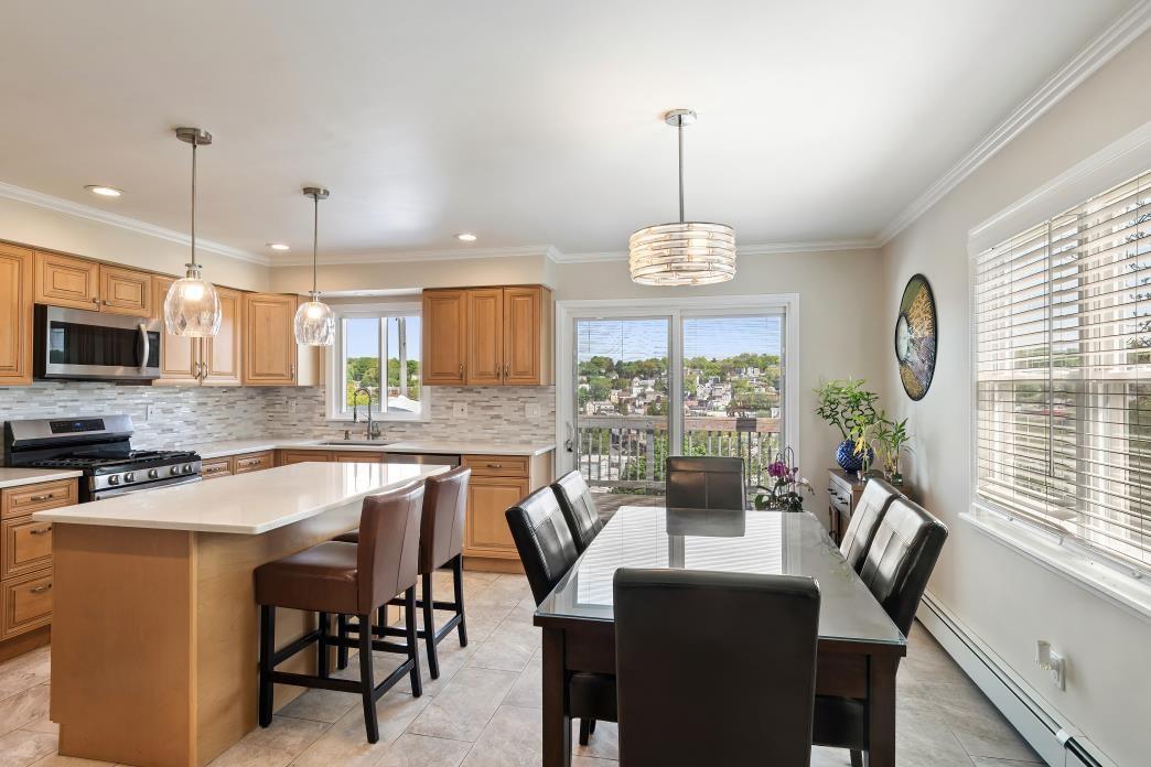 Eat-in-kitchen with door to deck