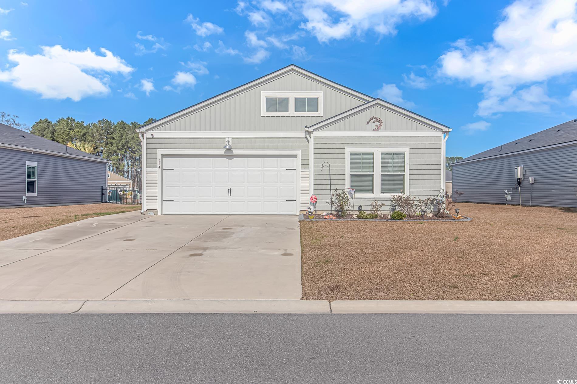 View of front facade with a garage