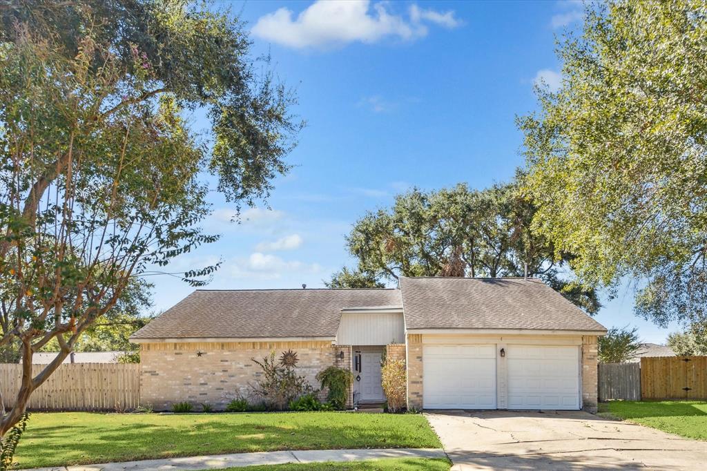 a house with trees in the background