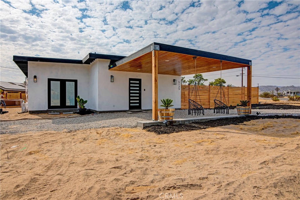 a house view with a outdoor space