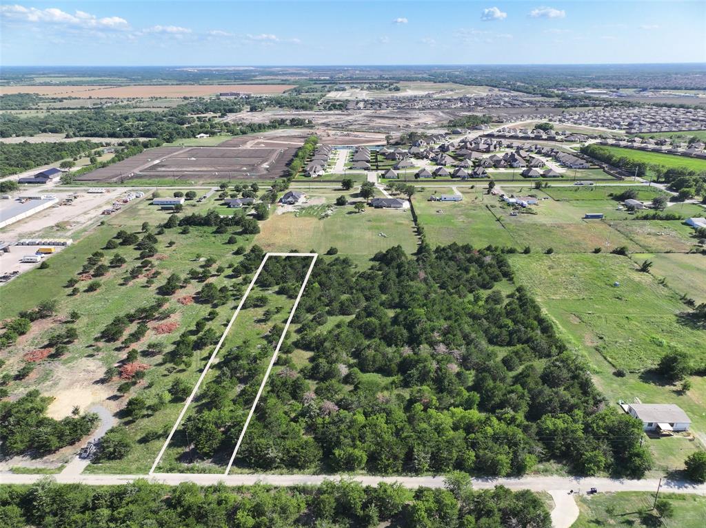 an aerial view of residential building with outdoor space