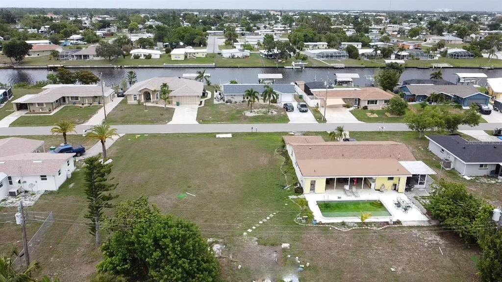 Aerial View of the house with vacant lot