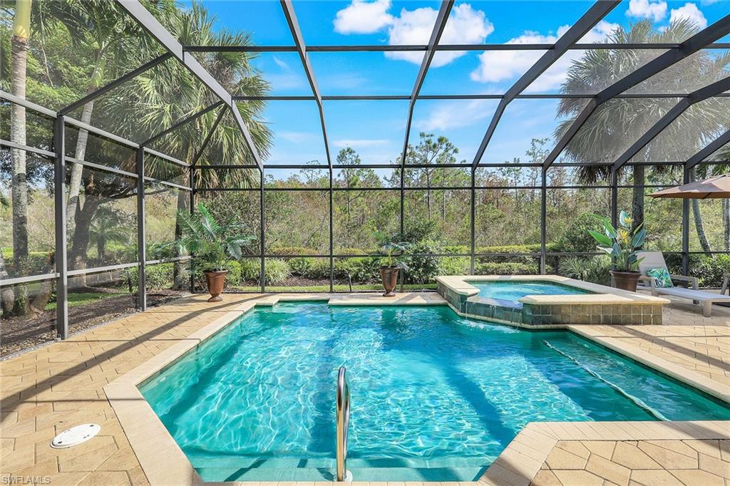 a view of swimming pool with a patio