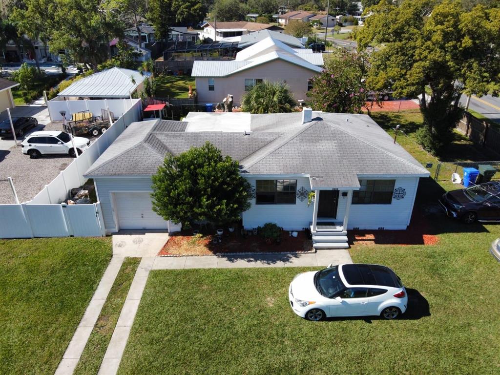 a aerial view of a house with garden