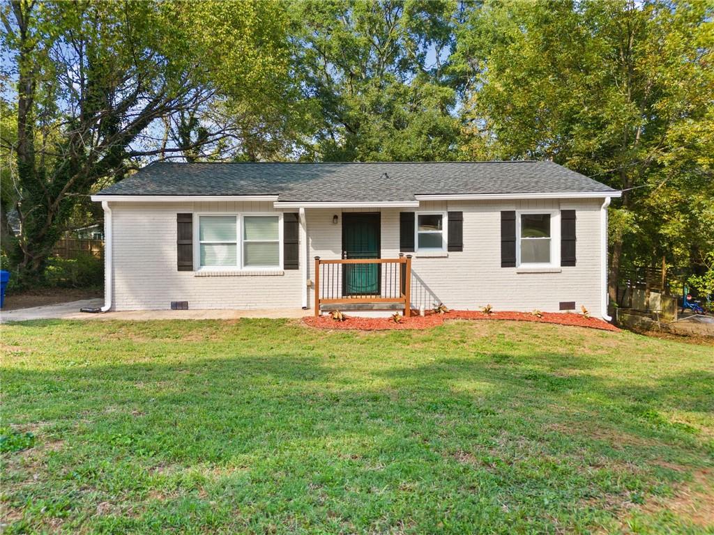 front view of a house with a yard