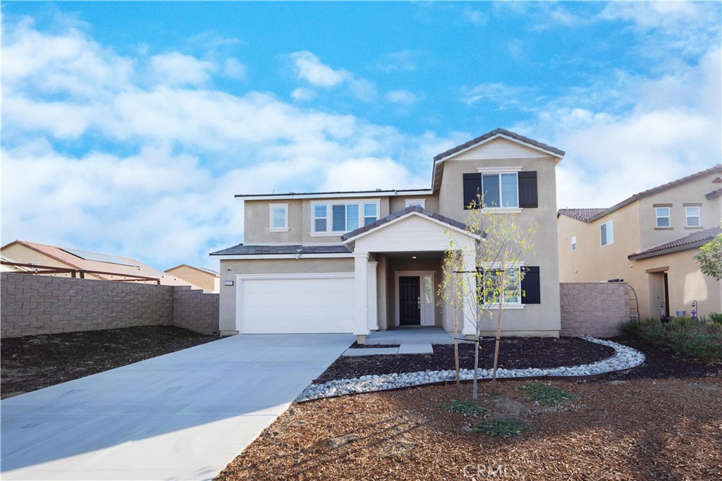 a front view of a house with entertaining space