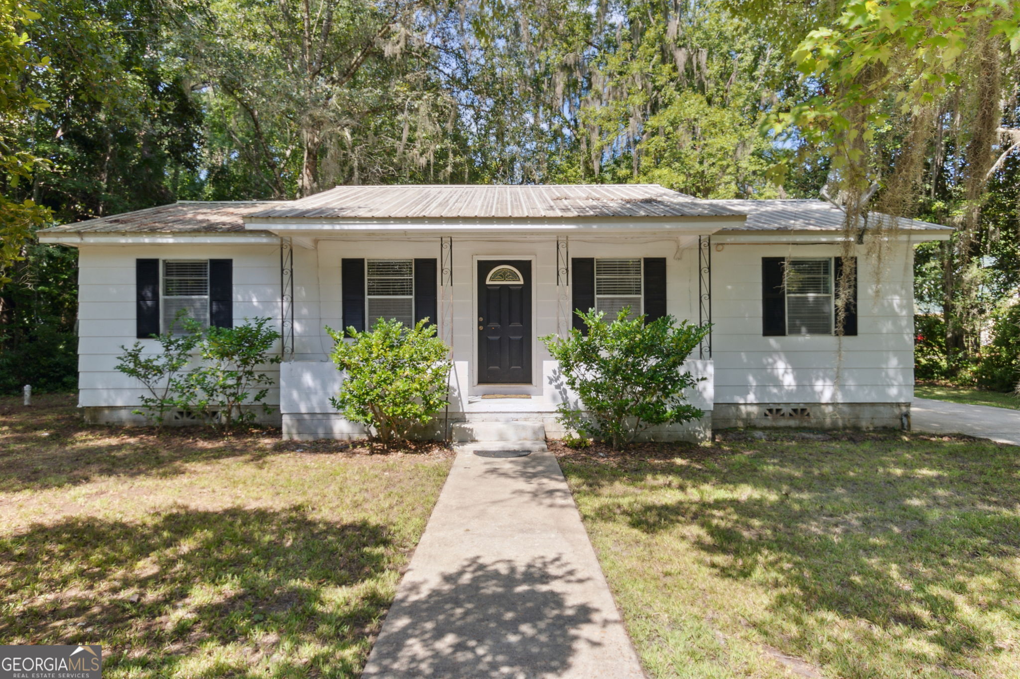 a front view of house with yard