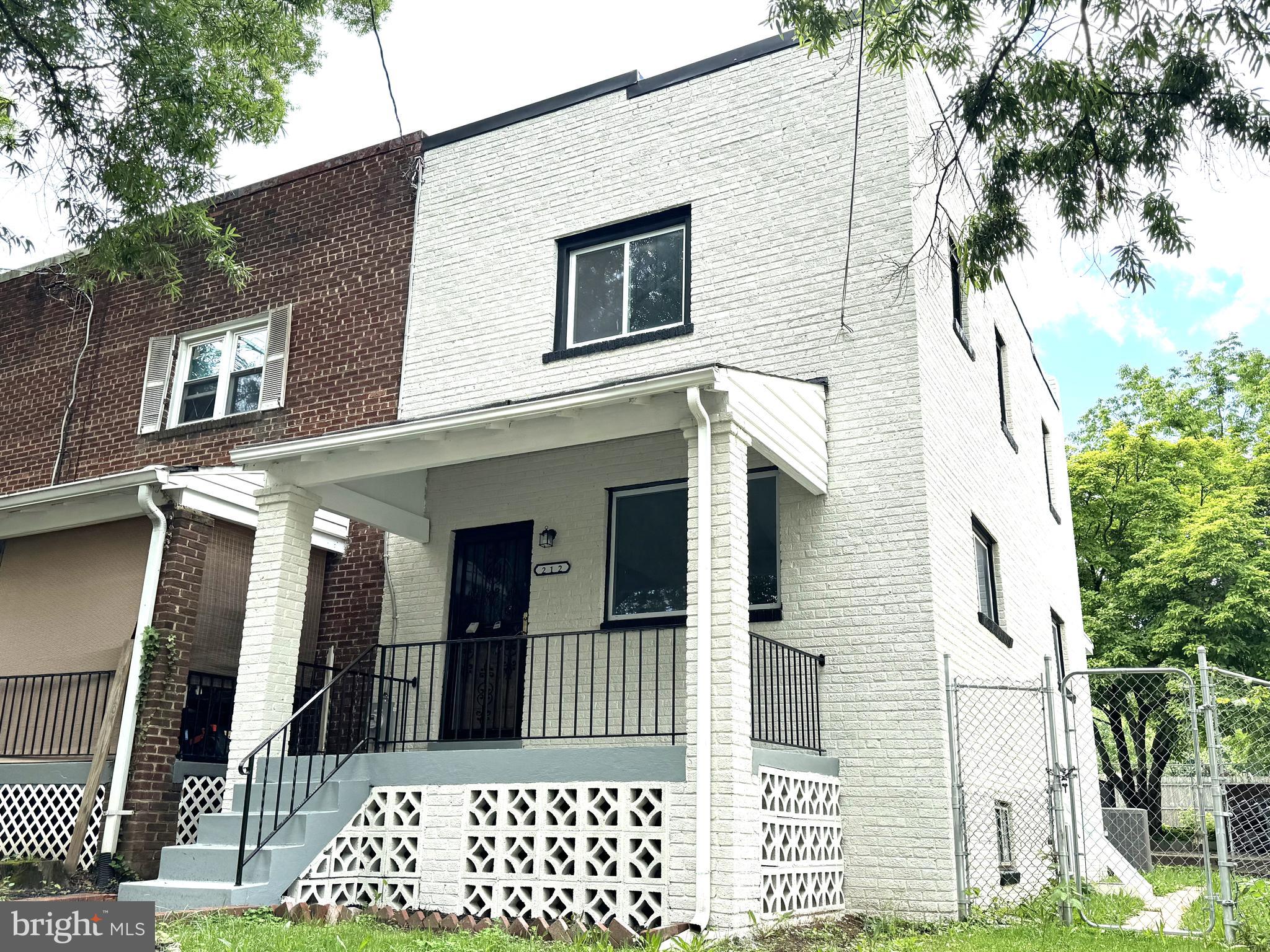 a view of a house with a large window