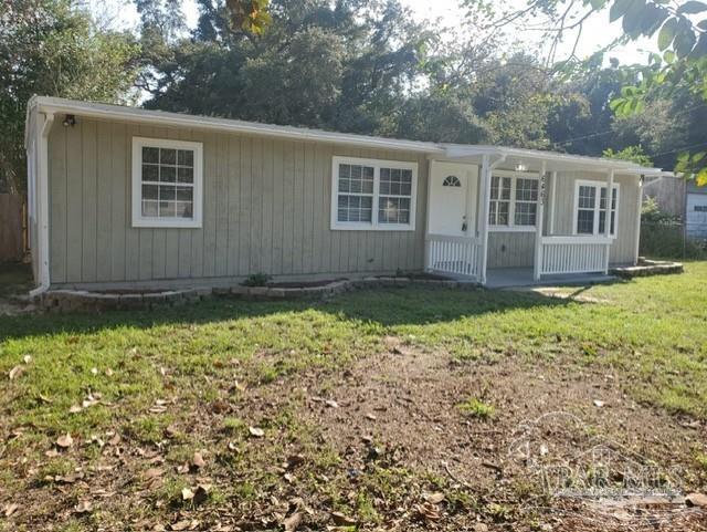 front view of a house with a yard