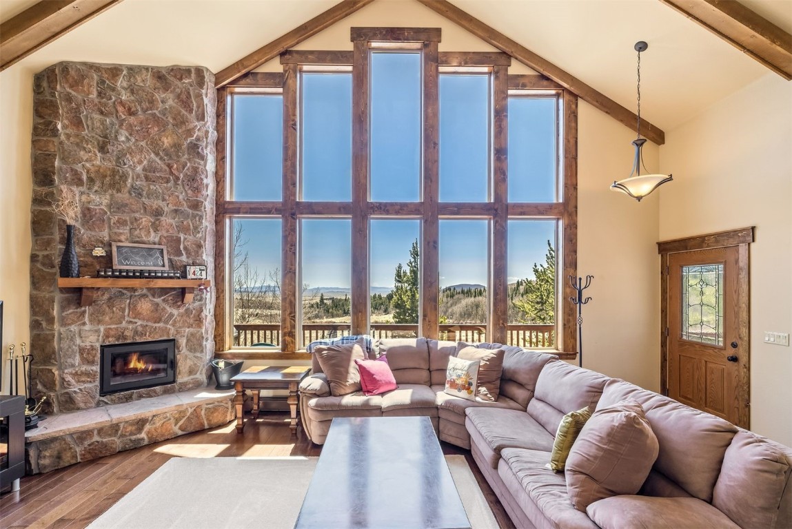 a living room with furniture or fireplace and a floor to ceiling window