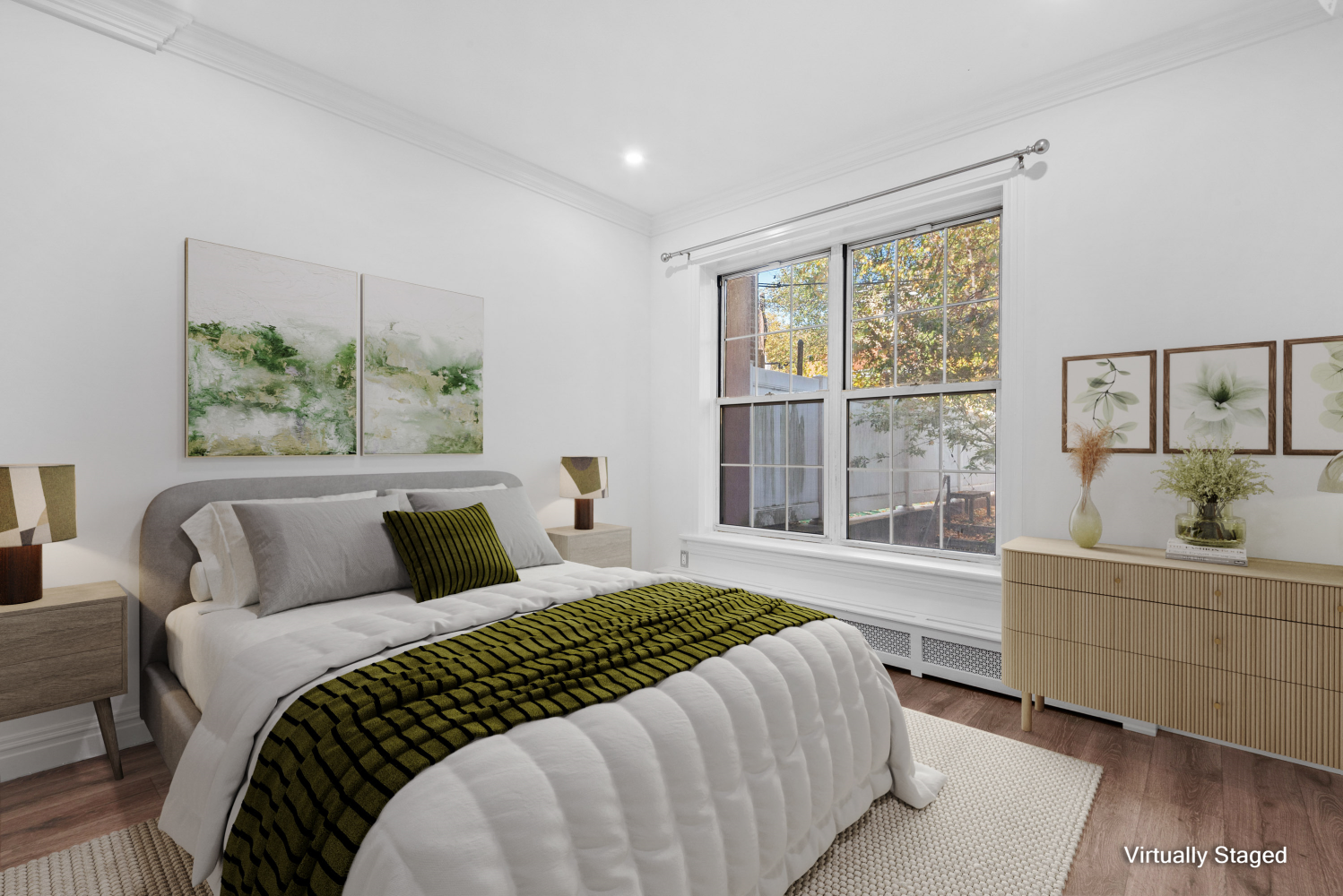 a bedroom with a large bed and a window