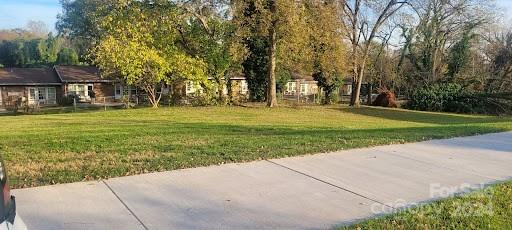 a view of a patio with a yard