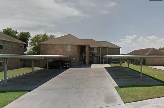 a view of house with outdoor space