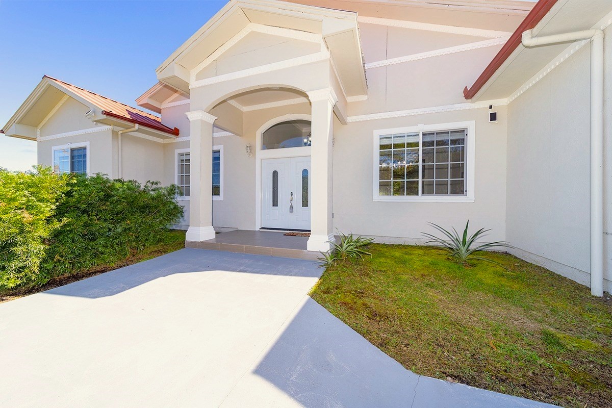 a house view with a outdoor space