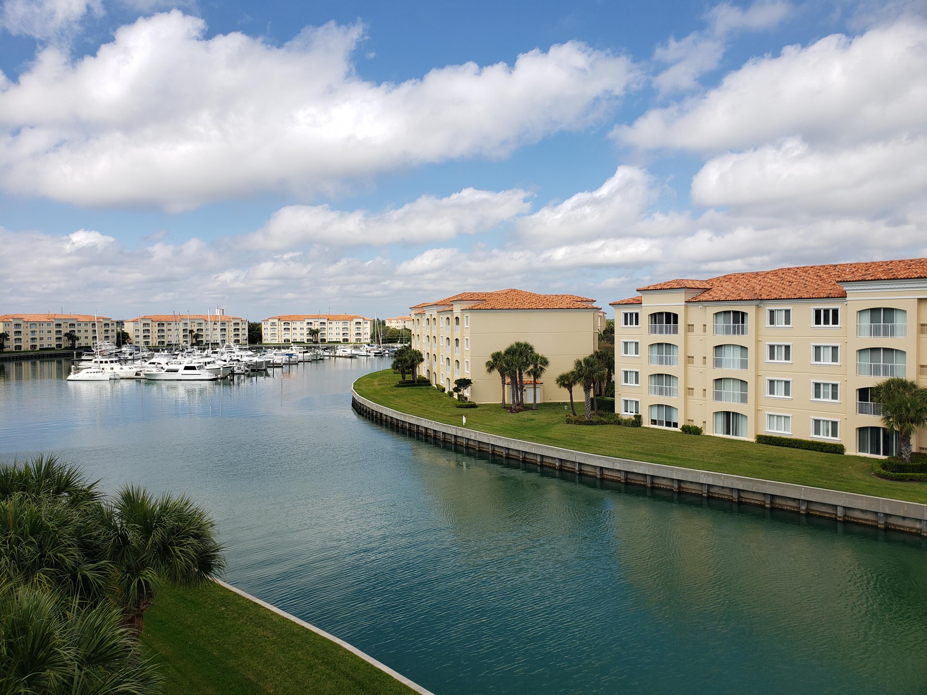 a view of a lake with big yard