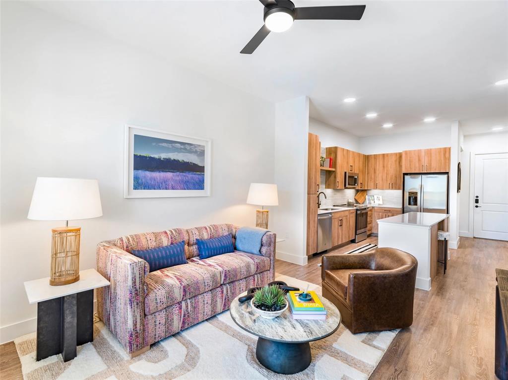 a living room with furniture and a table