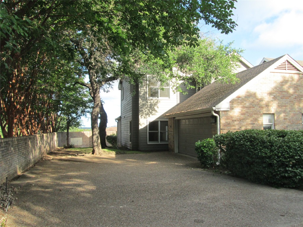 a house with trees in front of it