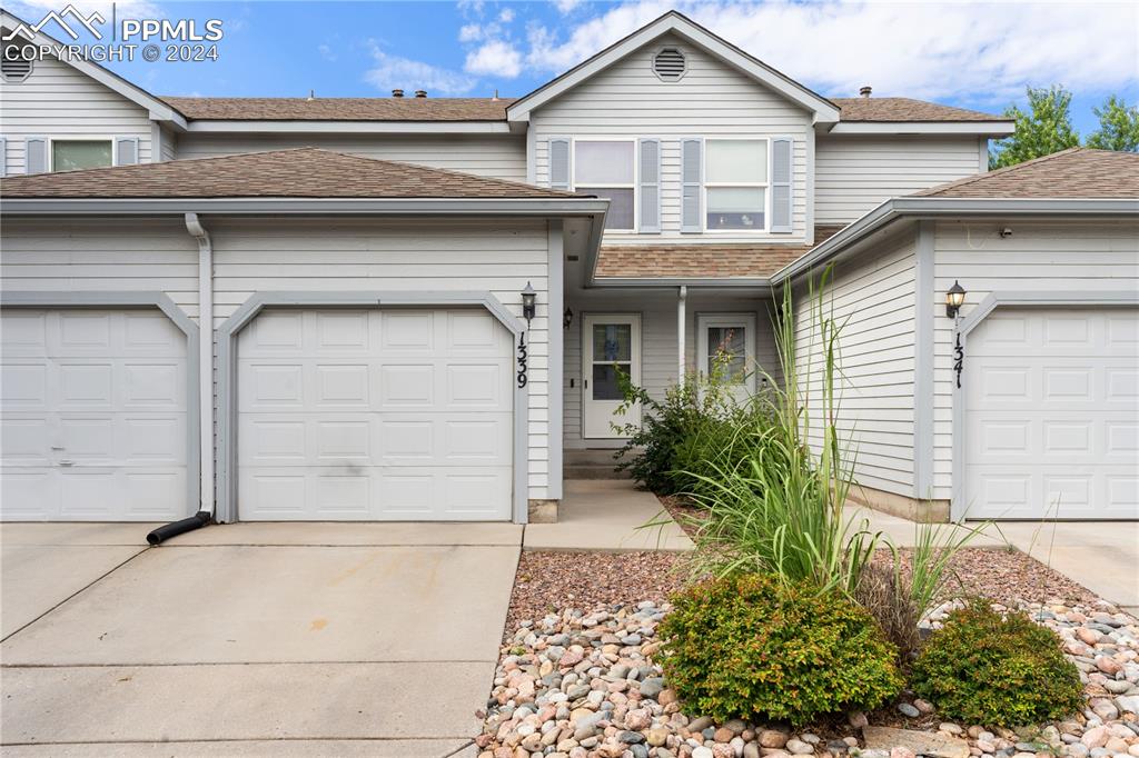 View of front of home with a garage