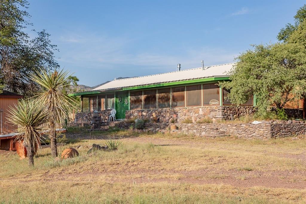 East facing view of the home.  A circular driveway allows for easy ingress and egress.