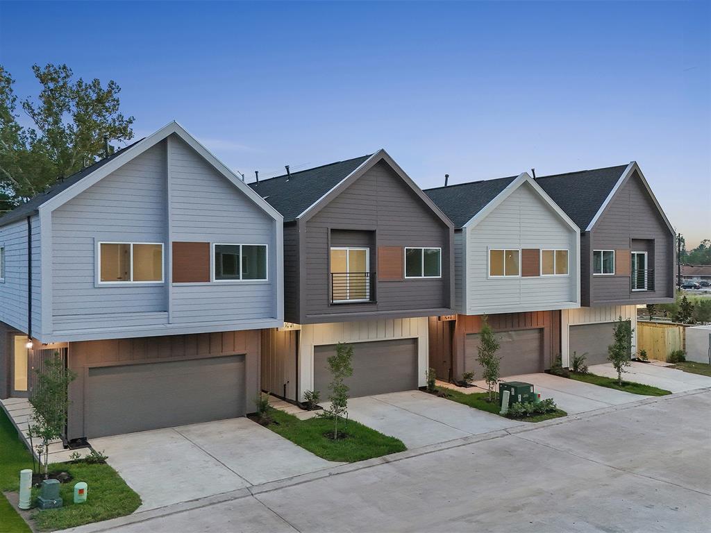 a front view of a house with yard