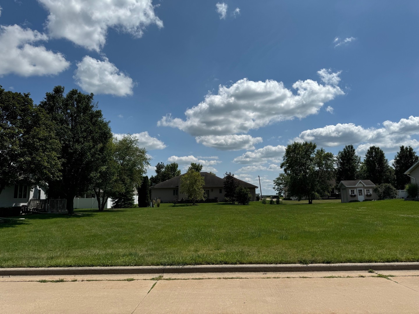 a view of a house with a big yard