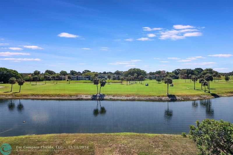 PUBLIC GOLF COURSE, LAKE FRONT, CONDO ASSOCIATION OWNS THE LAKE.