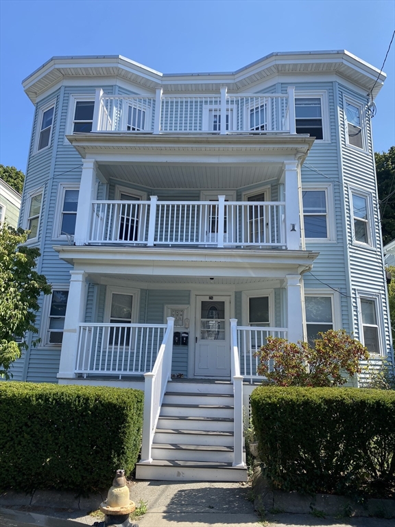 a view of a house with a deck