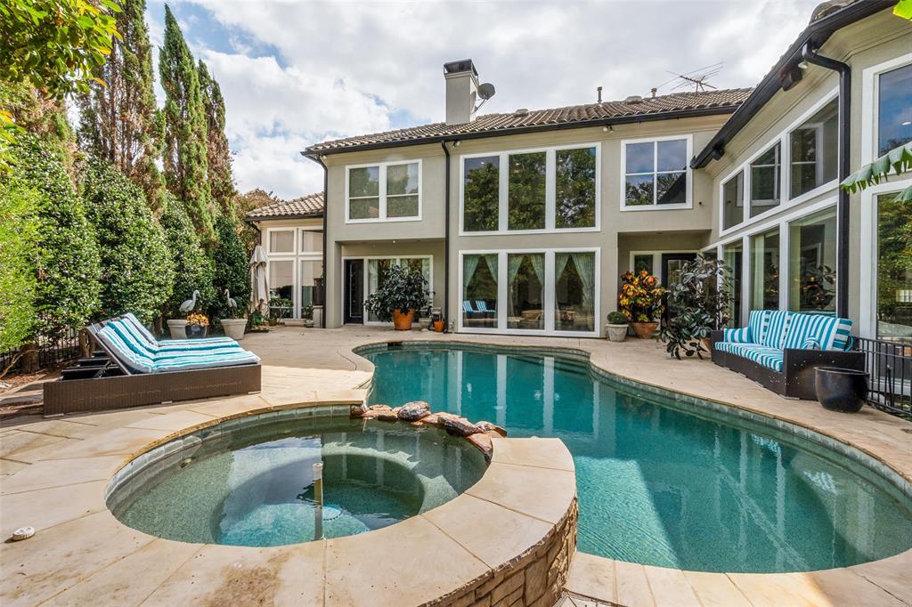 a view of a house with swimming pool