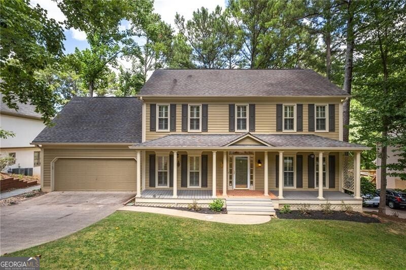 front view of a house with a yard