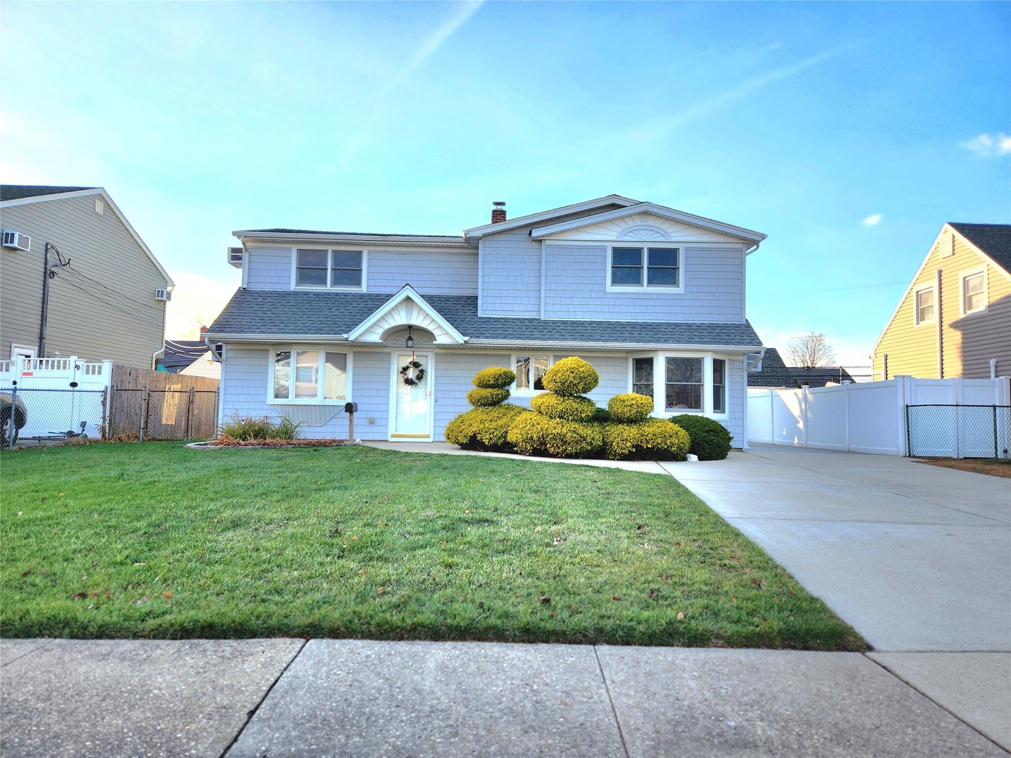 Front facade with a front yard