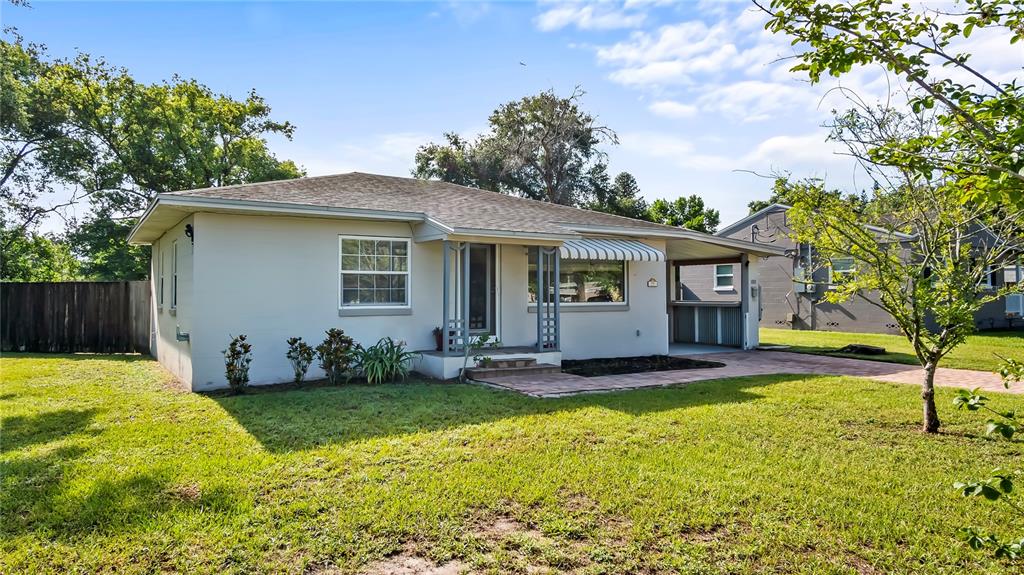 a front view of house with yard and patio