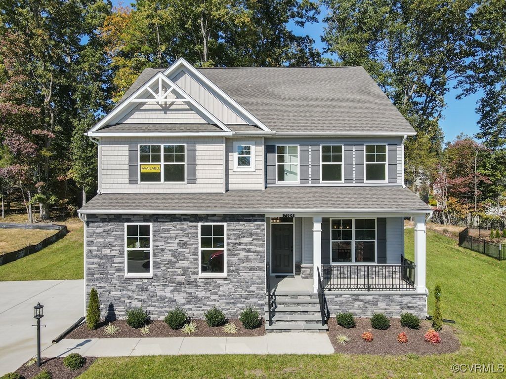 a front view of a house with yard