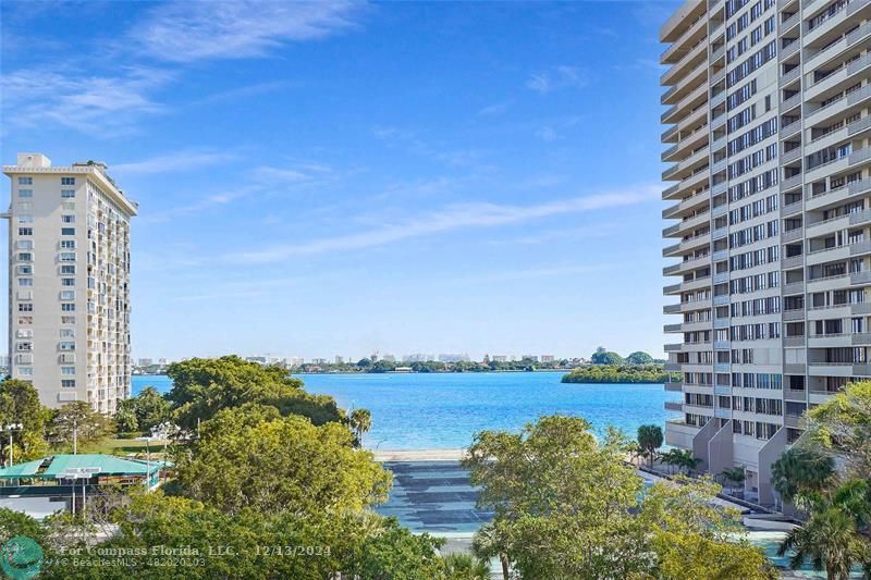 a view of a lake with a building in front of it