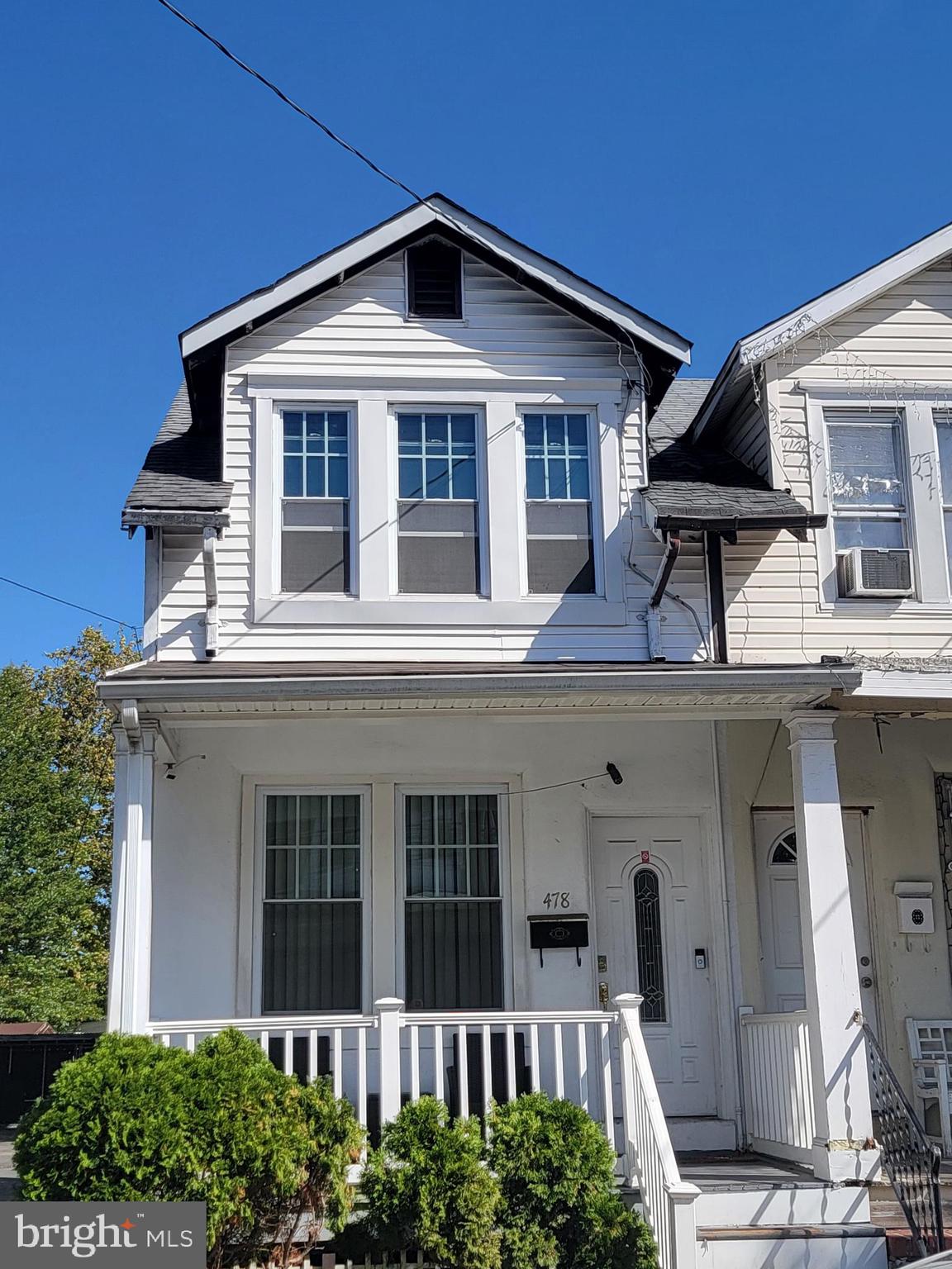 front view of a house with a porch