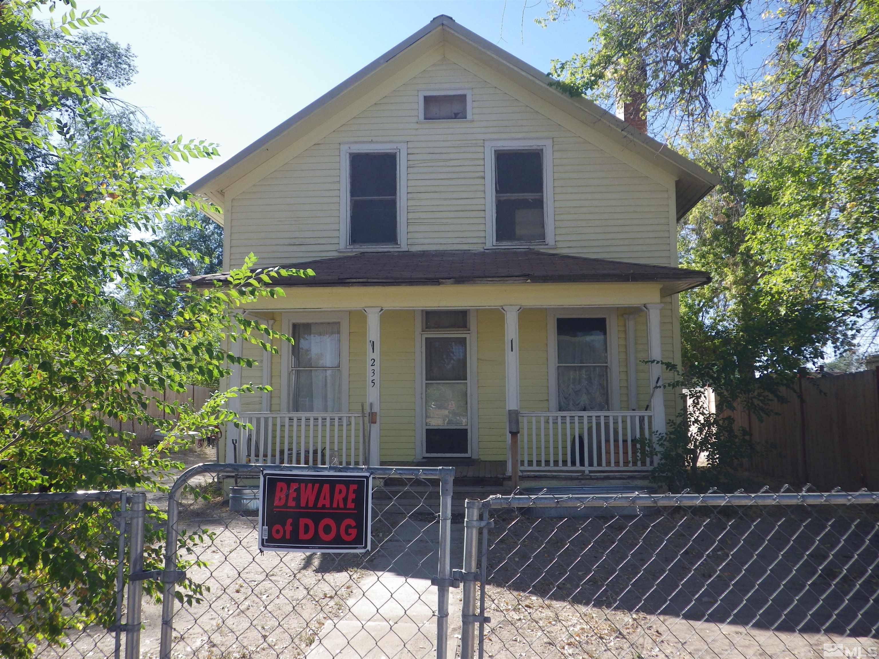 a front view of a house with balcony