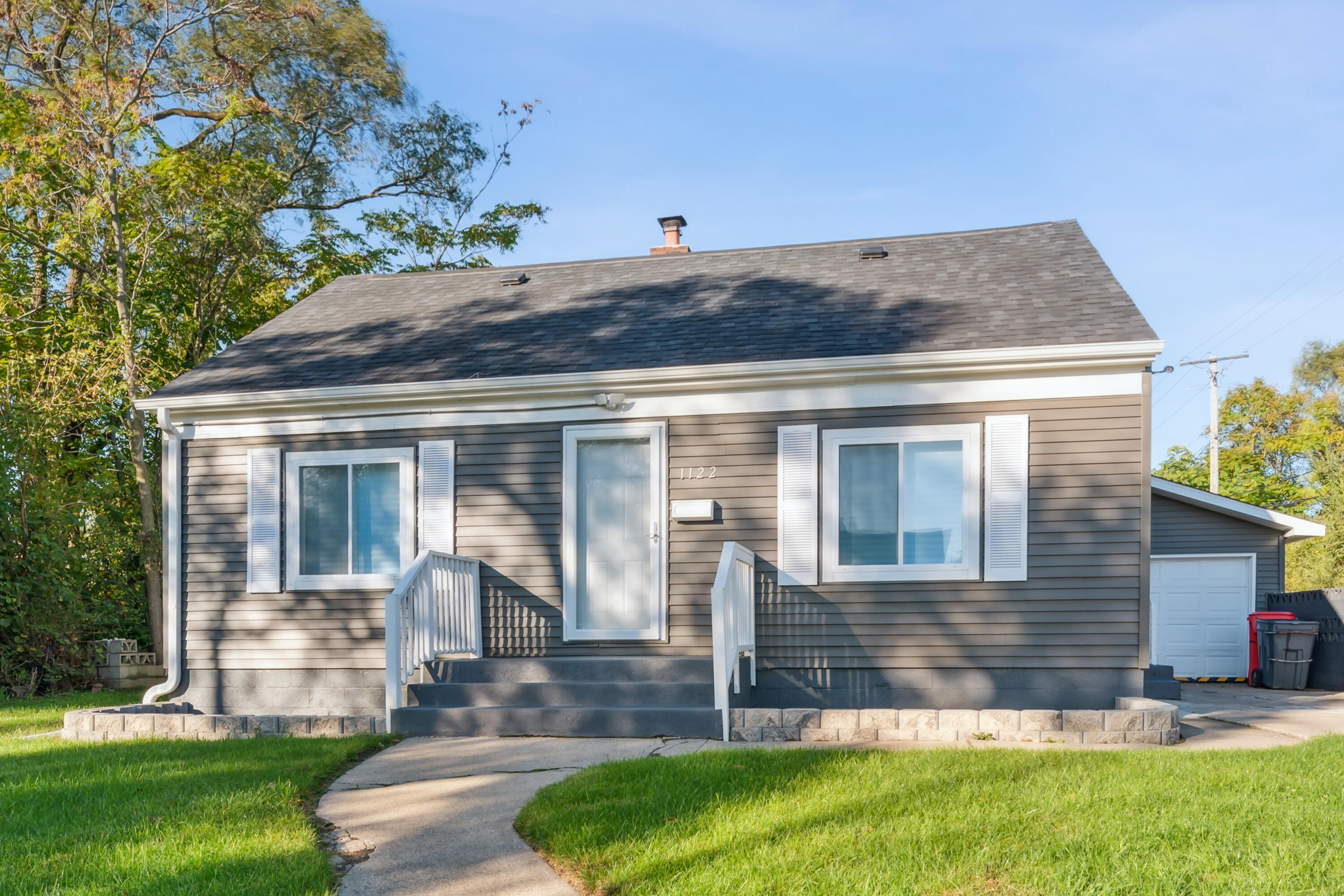 a front view of house with yard